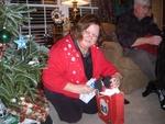 Sallie B opening her present